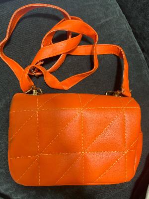 orange cross bag