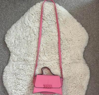 small pink primark cross bag