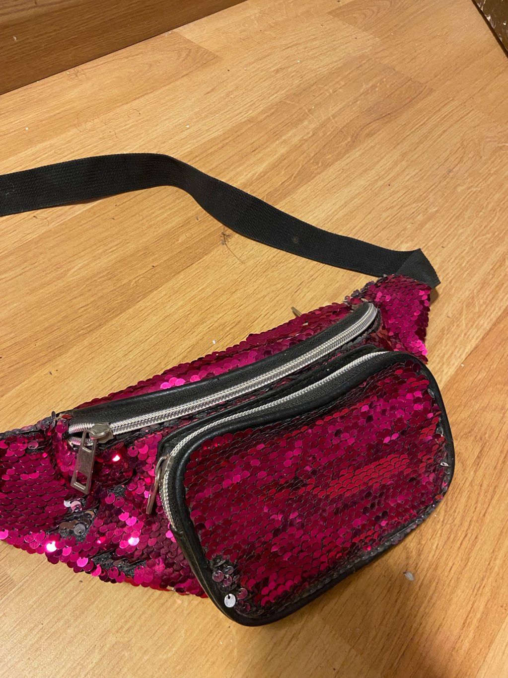 pink and black waist bag