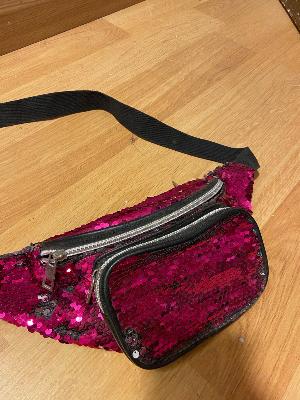 pink and black waist bag
