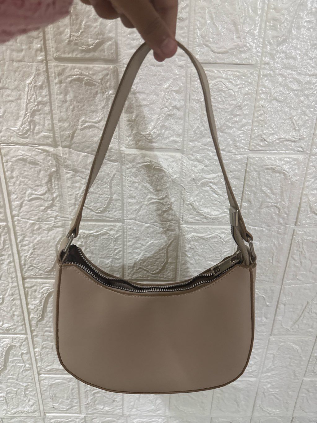 beige handbag