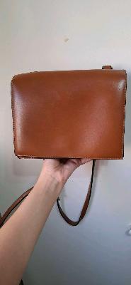 brown cross bag