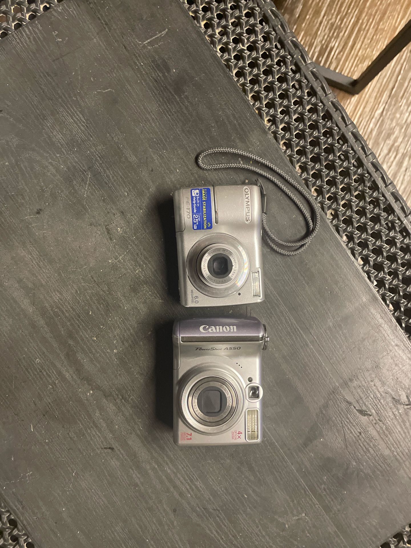 two camers canon and olympus