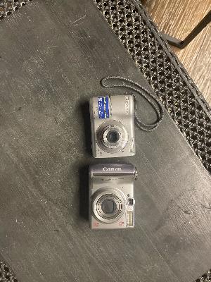 two camers canon and olympus