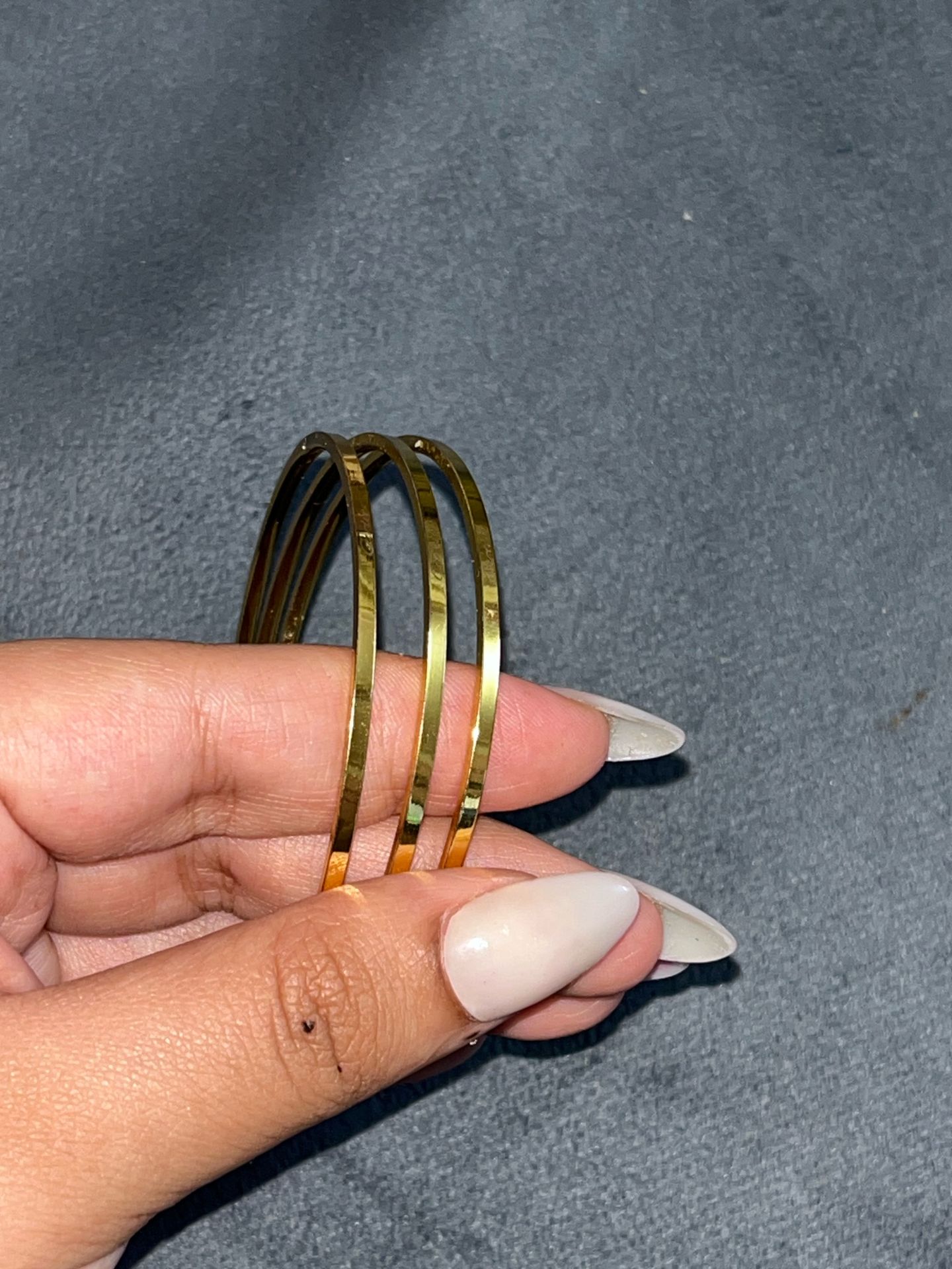 Thin gold bangles