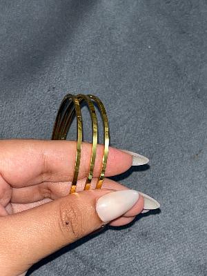 Thin gold bangles