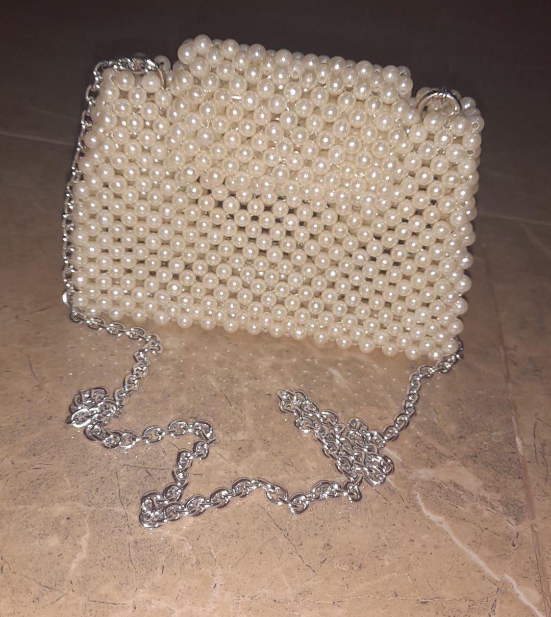 Pearl beaded clutch bag