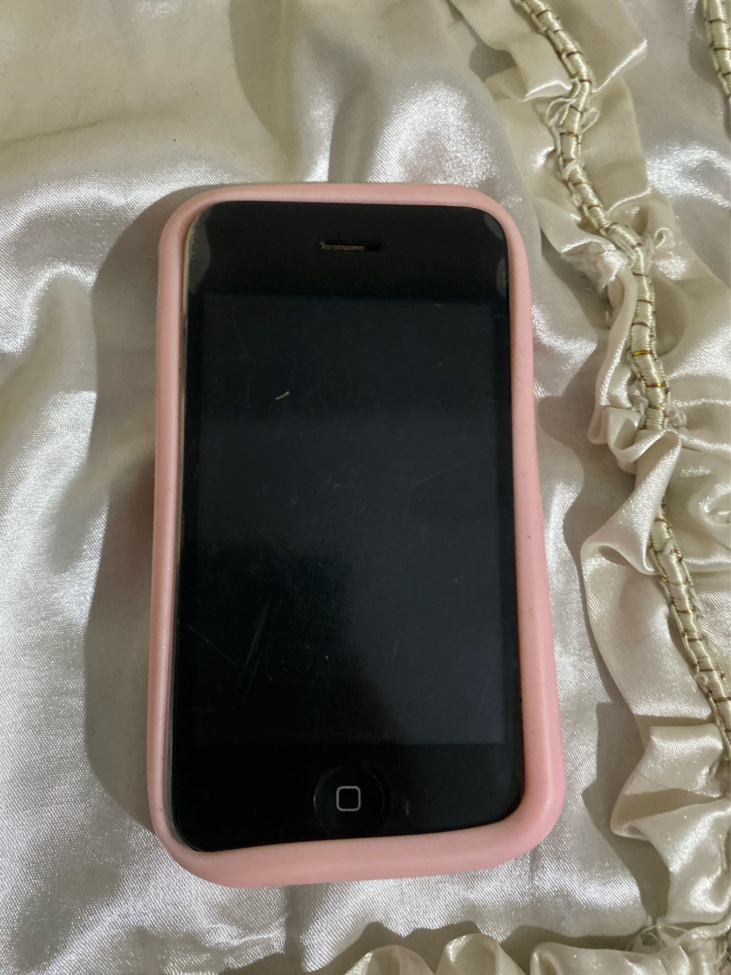 iPhone 1 with Pink Case