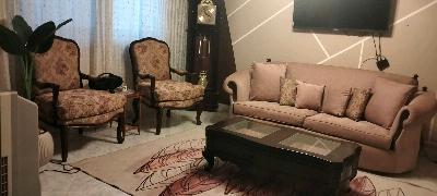Beige Upholstered Sofa