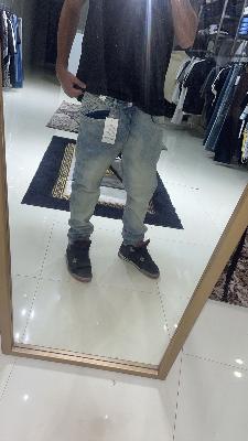 Light gray jeans with tag