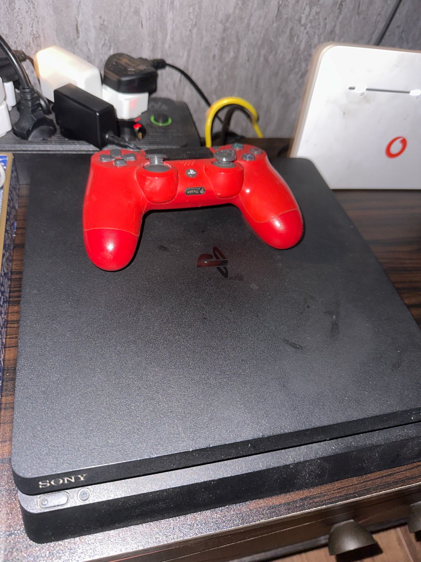 PS4 Console with Red Controller