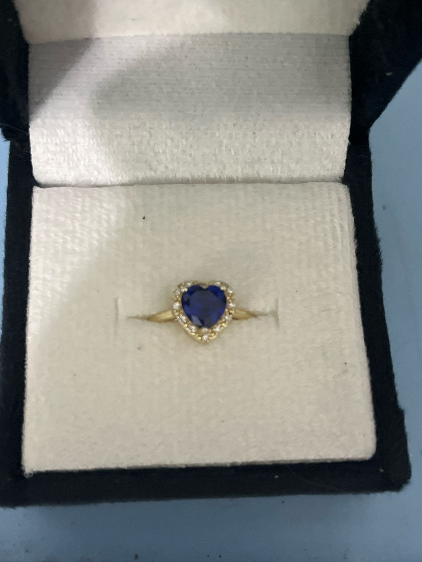 Heart-shaped golden Ring