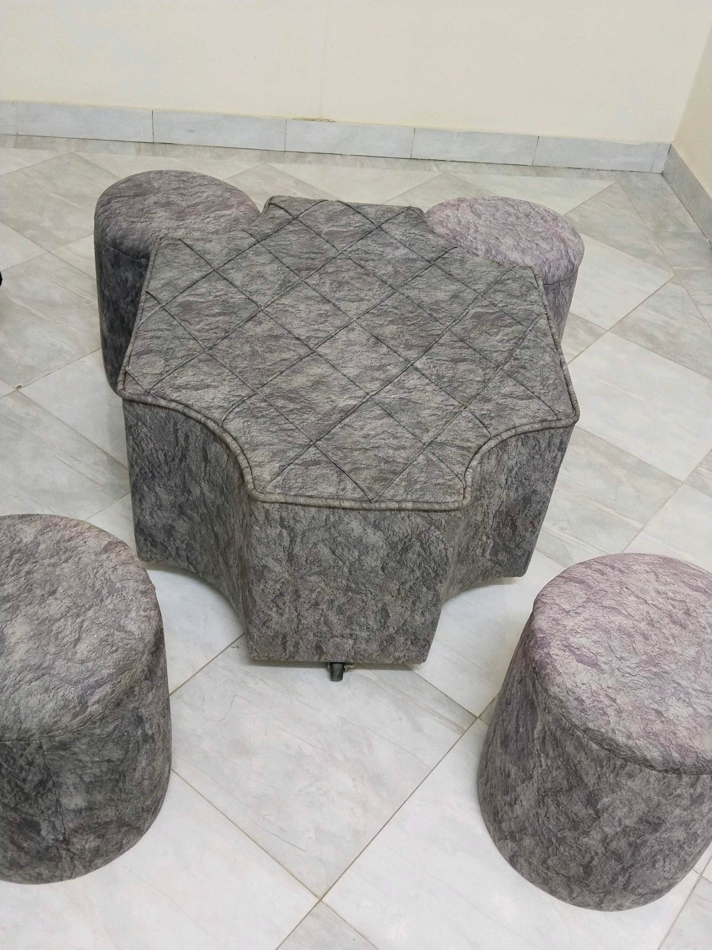 Upholstered Chair with Poufs