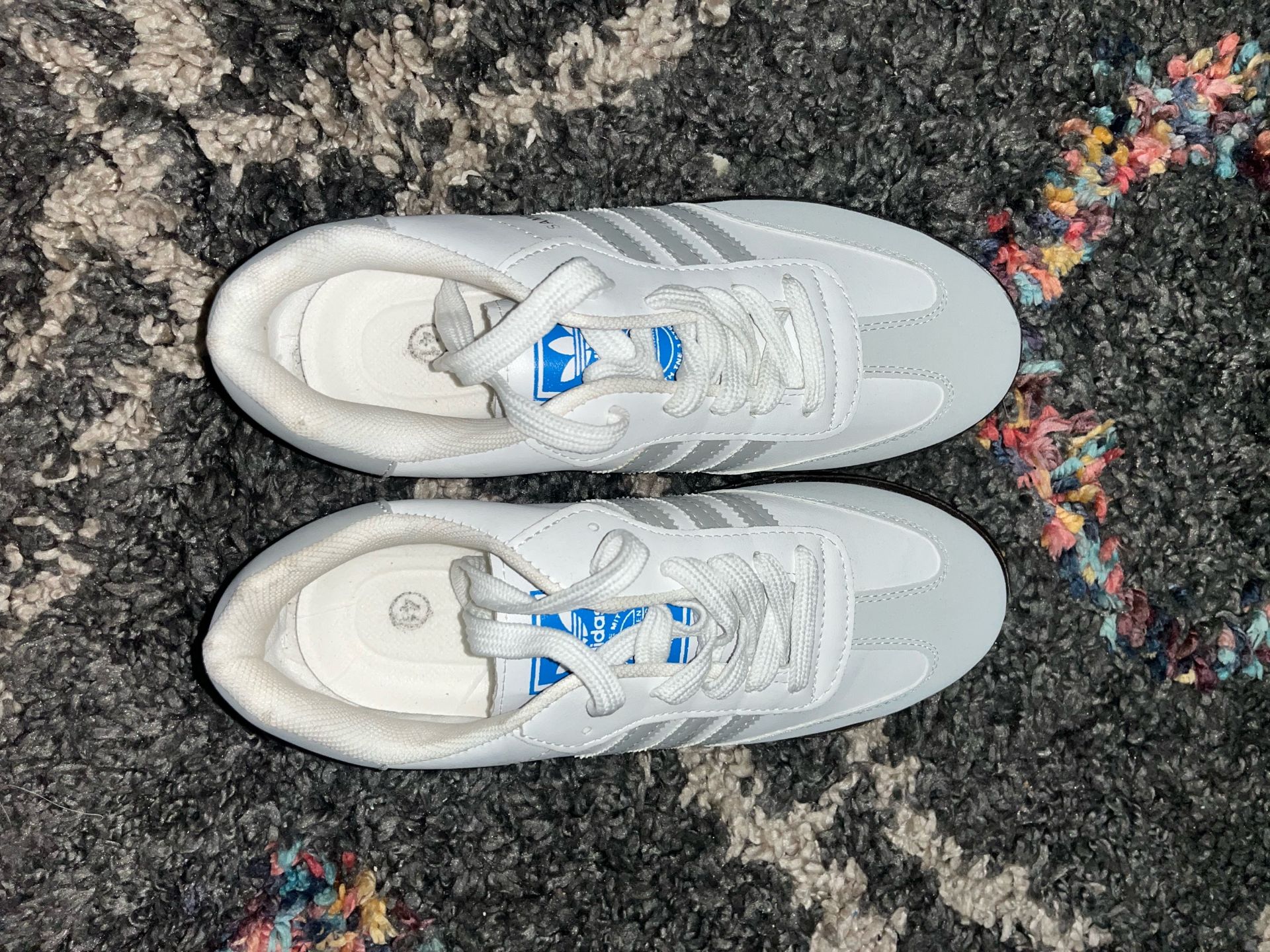 White Sneakers with Blue Accents