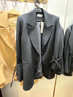 Formal suit with ribbons
