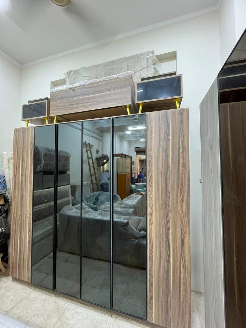 Wardrobe with mirror doors