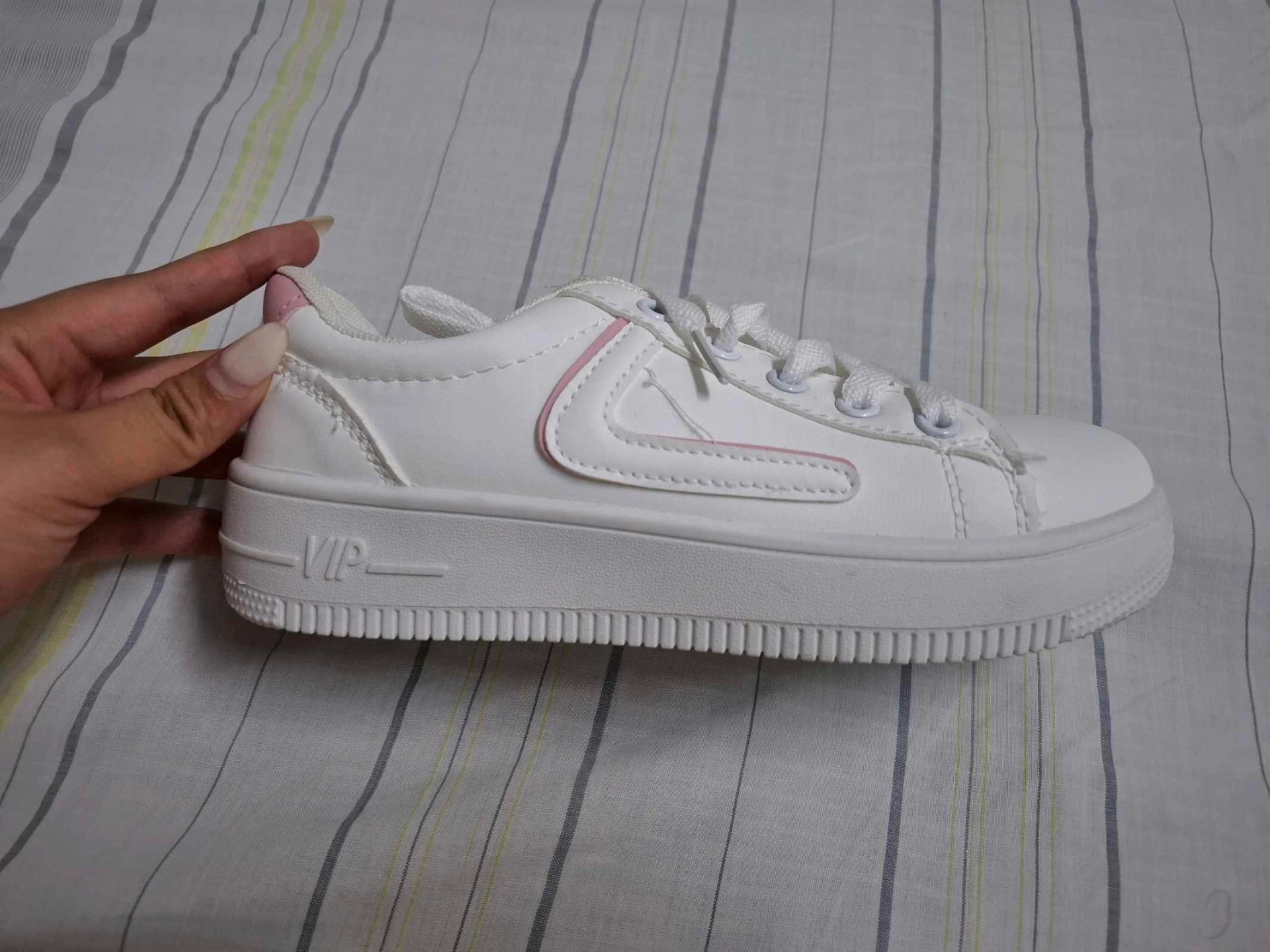 White sneakers pink trim