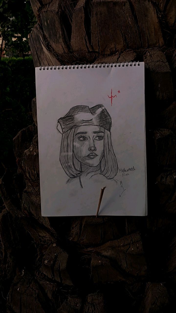 Sketchbook with Portrait Drawing