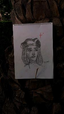 Sketchbook with Portrait Drawing