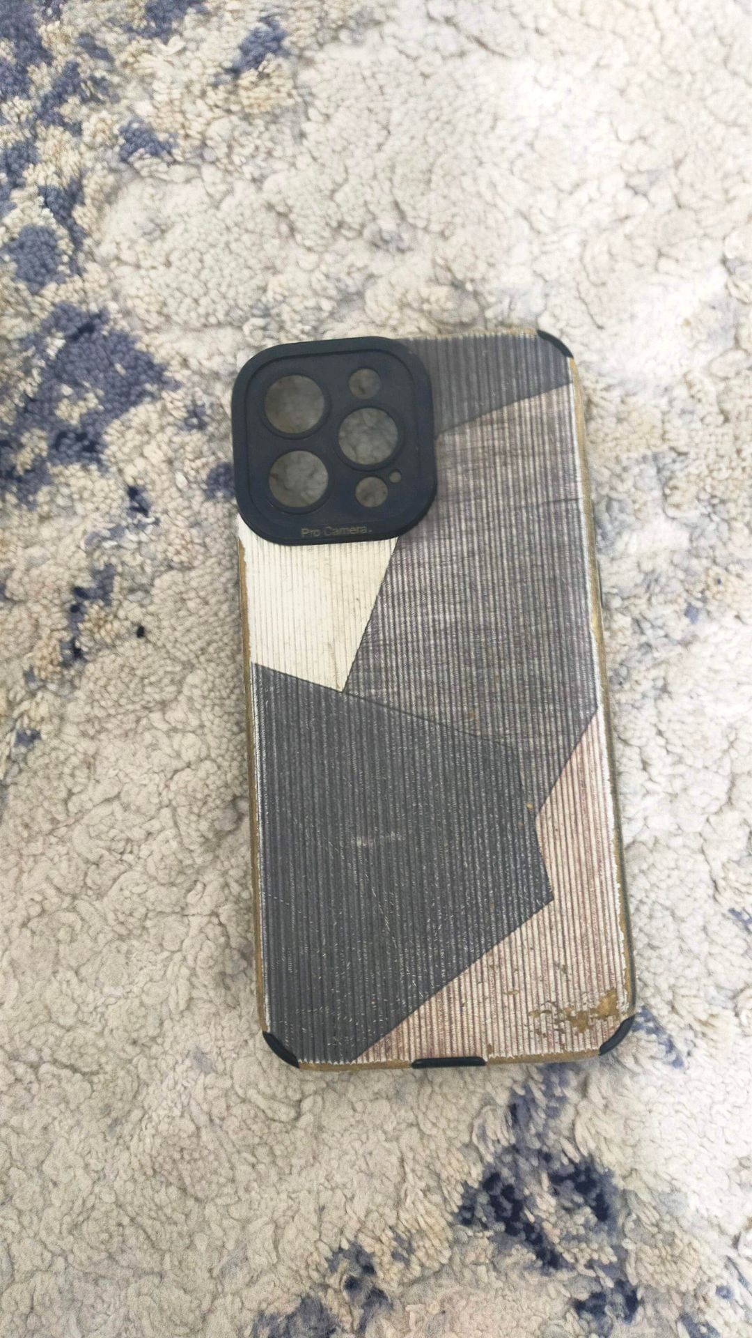 Phone case with camera lens cover