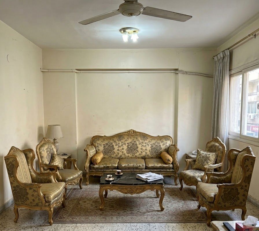 Ornate sofa set with chairs
