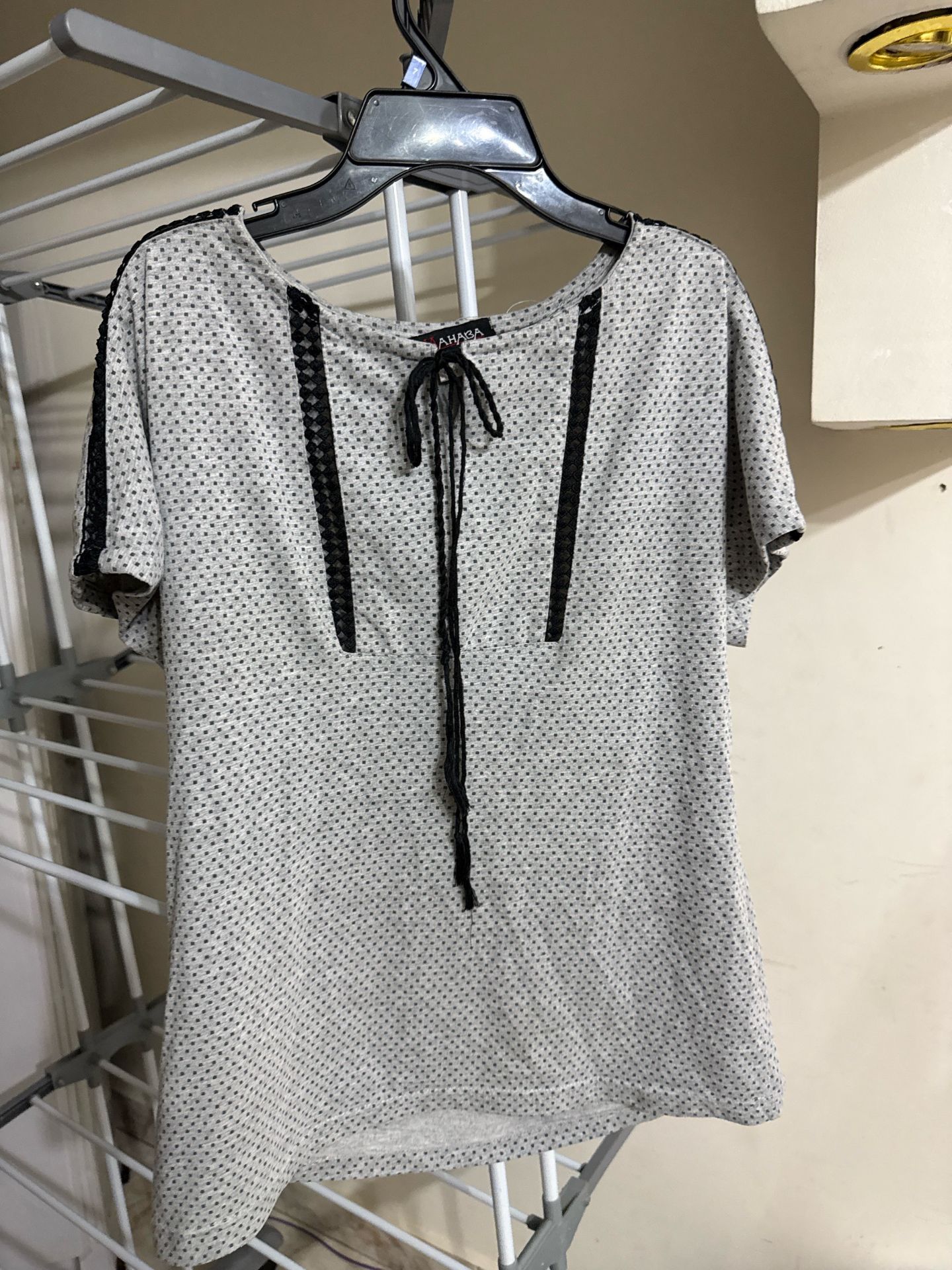 Polka dot blouse with lace trim